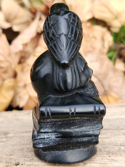 Raven on Skull on Books